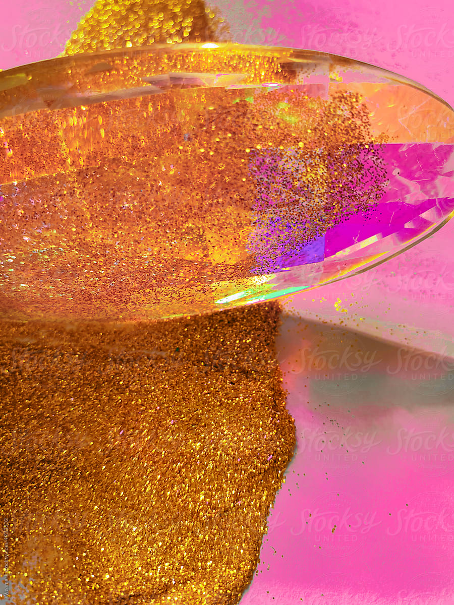Glass luminous prism sprinkled with golden brilliant glitter.