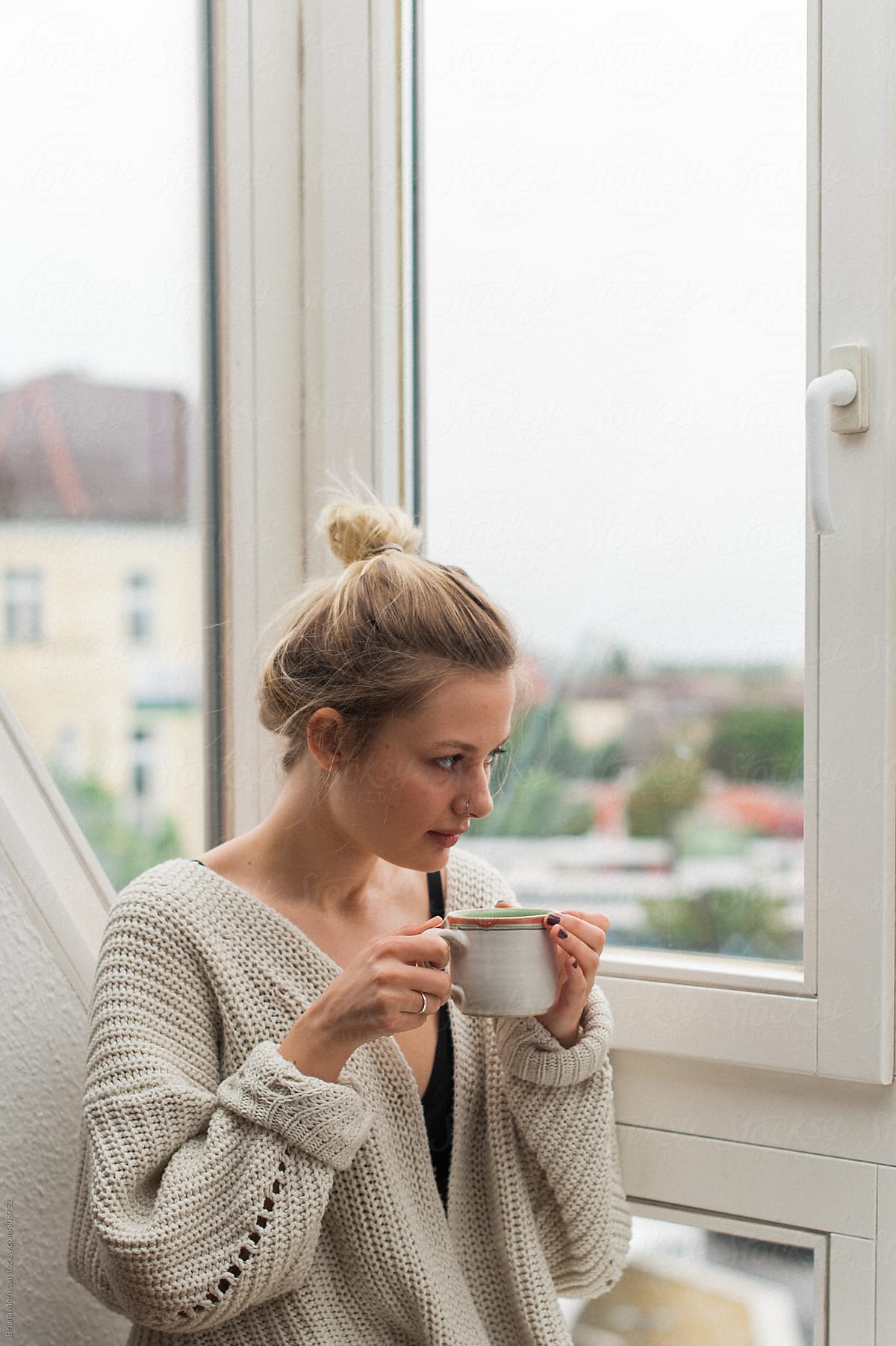 Woman in Window with Tea