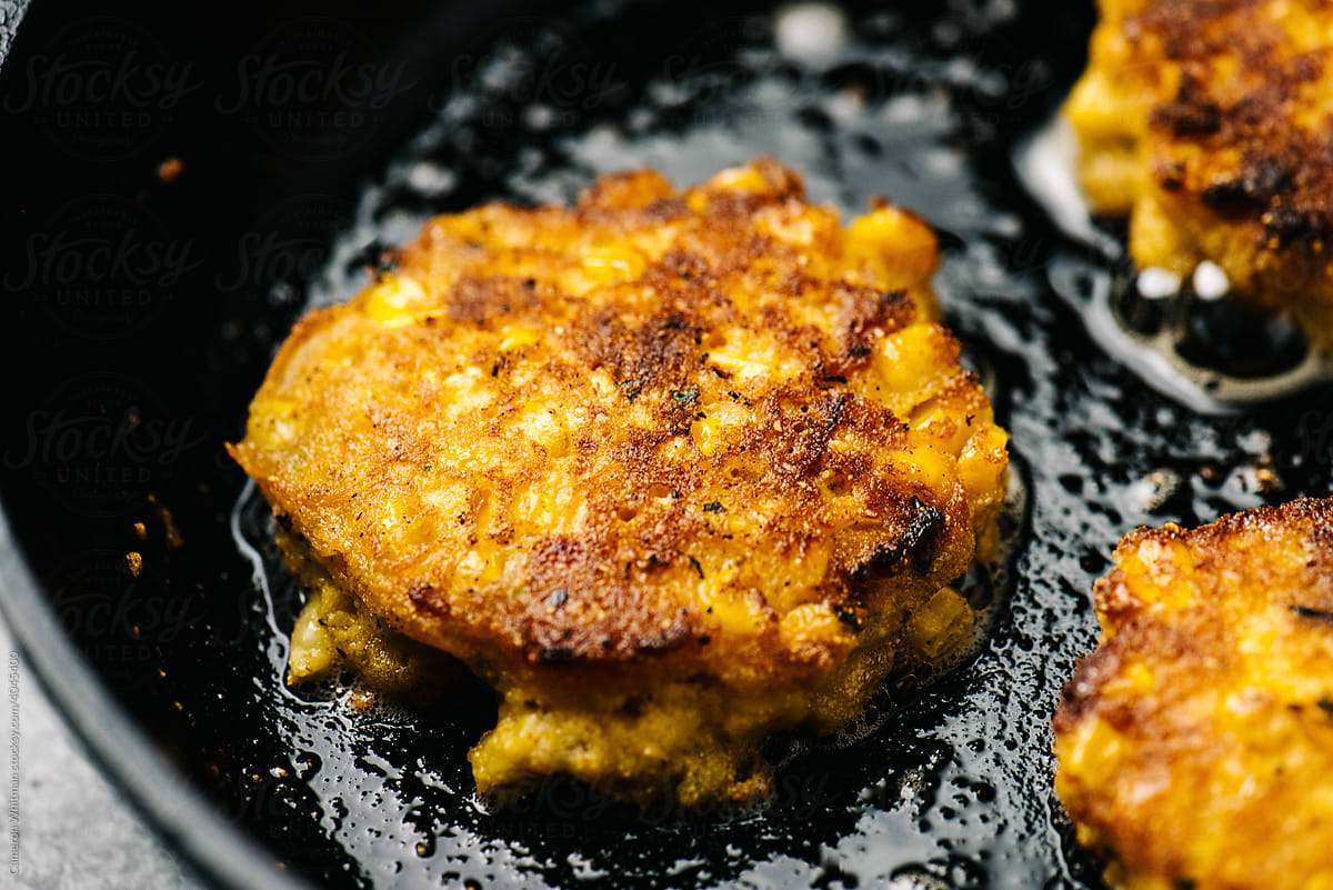 Frying homemade corn fritters