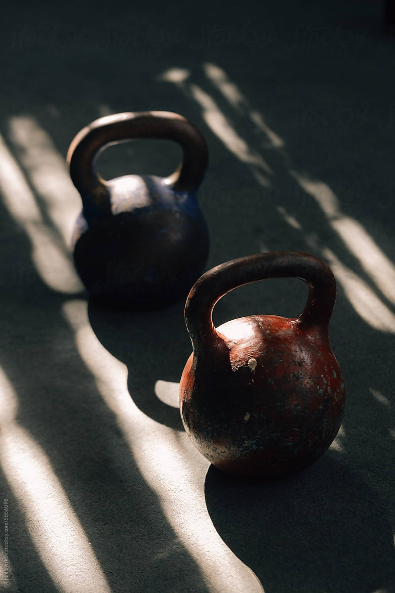 Weights illuminated by the evening sun