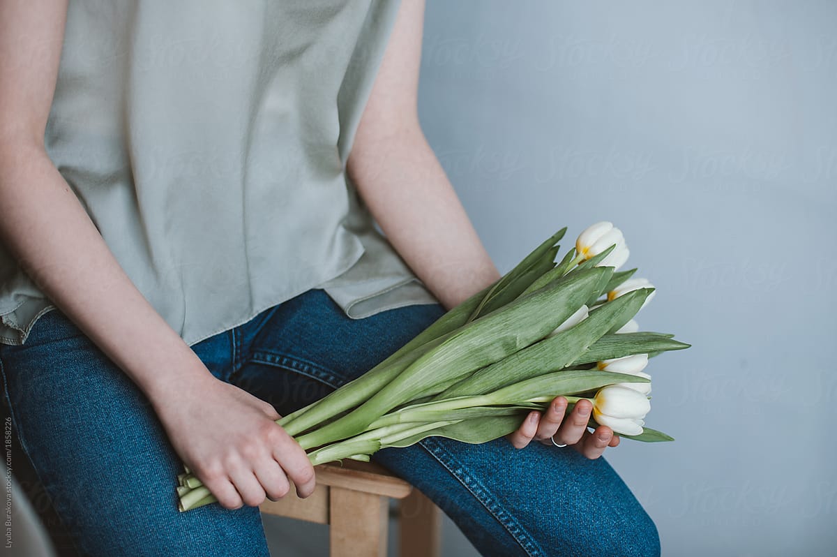 Woman with white tulips