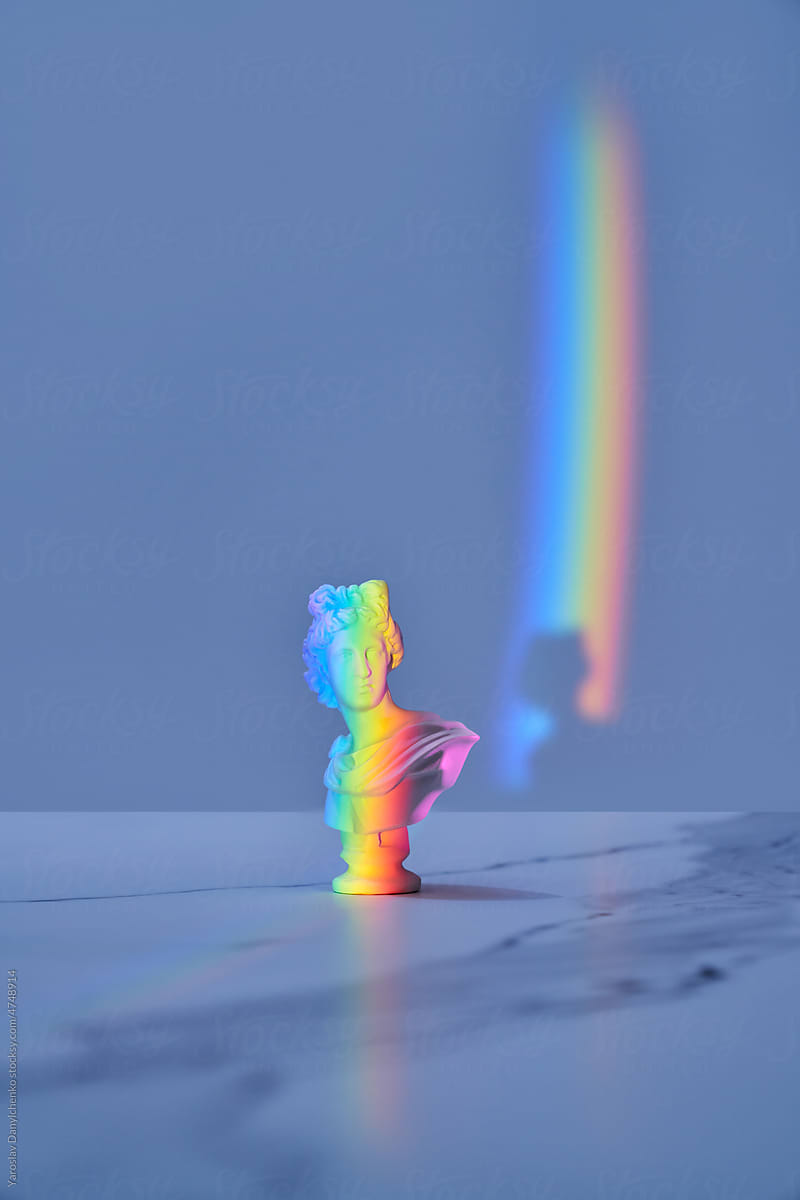 Bust of classical goddess with rainbow effect.