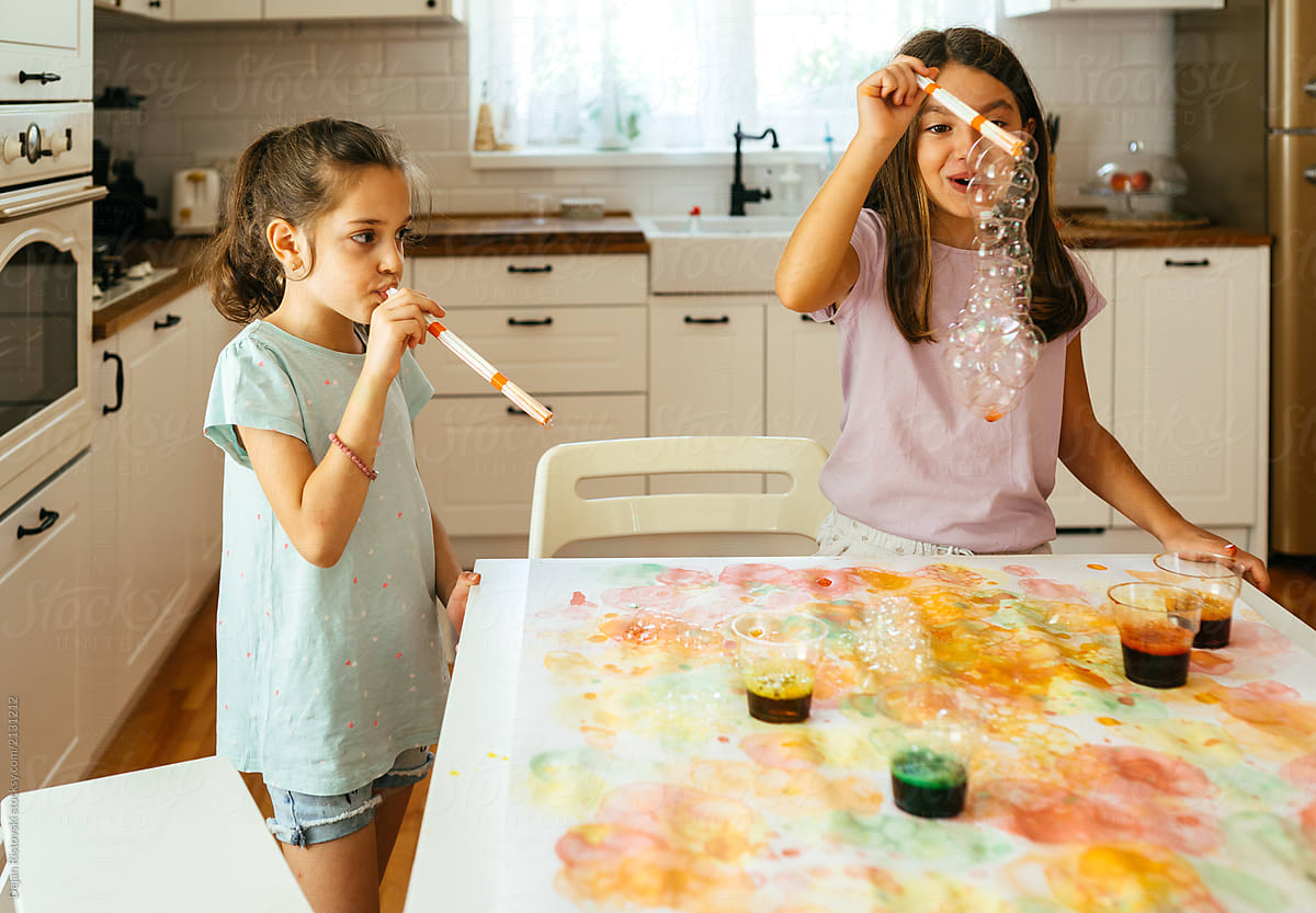 Children making art with bubbles