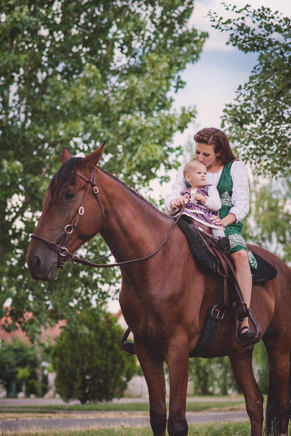 baby riding horse