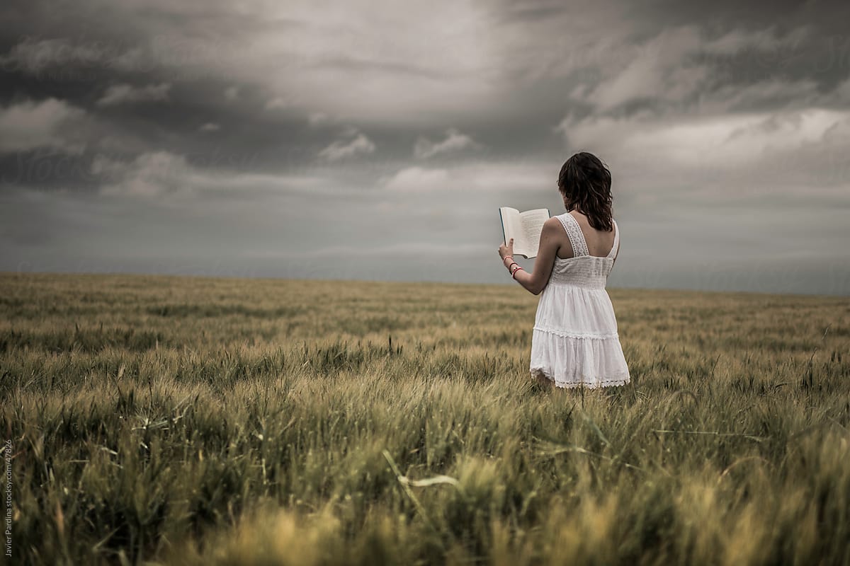 woman reading at nature