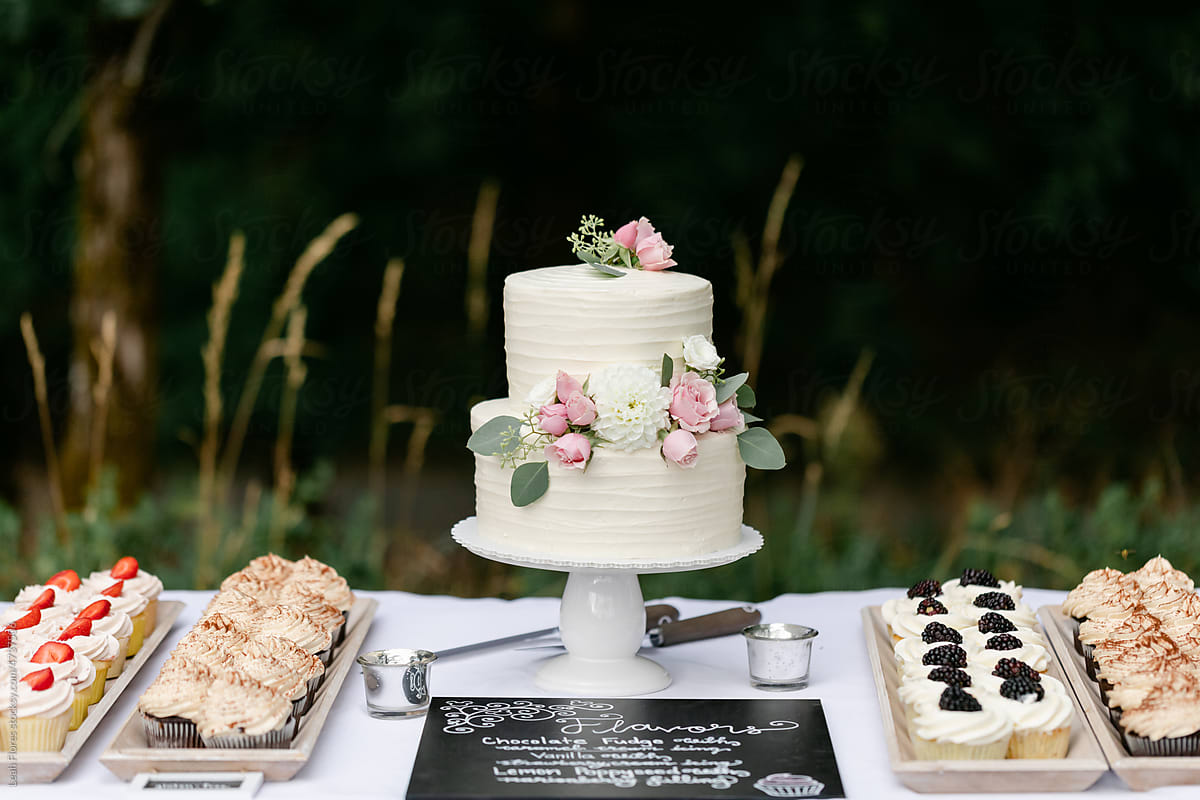 Dessert Table with Wedding Cake and Cupcakes