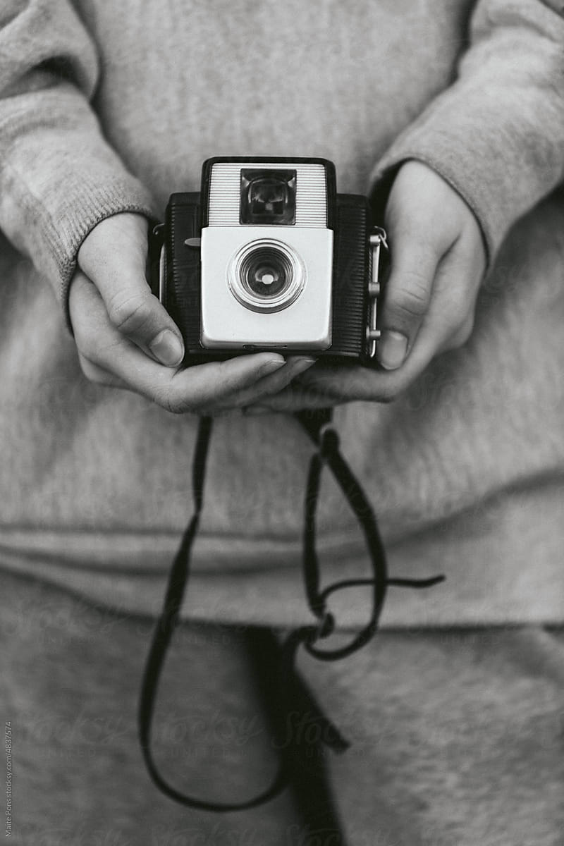 Teenager Holding Vintage Camera