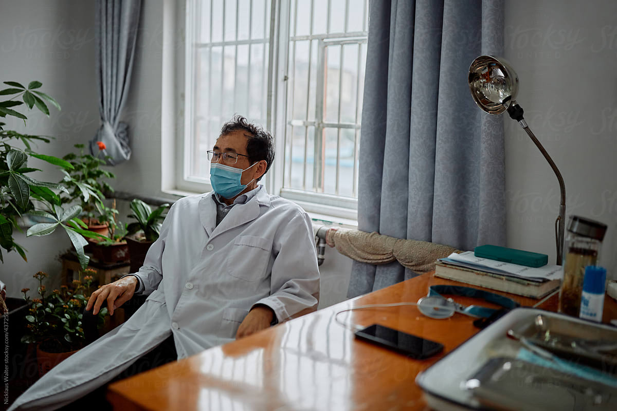 Portrait of a Chinese doctor in his hospital office