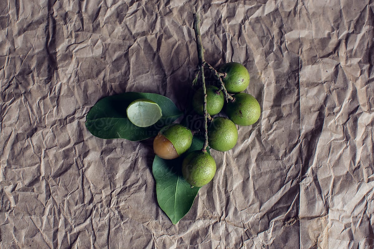 Genips or spanish limes on a brown paper background