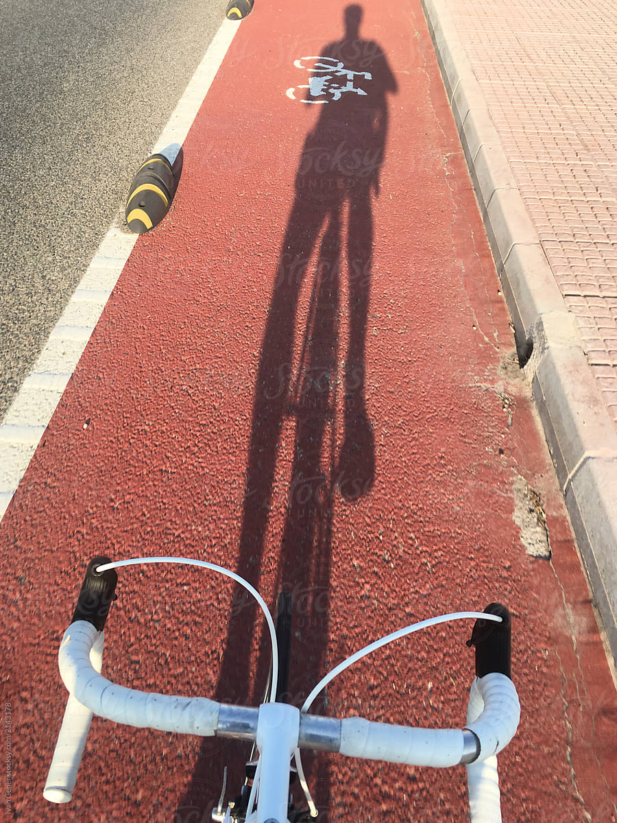 Cycle friendly path with biker shadow