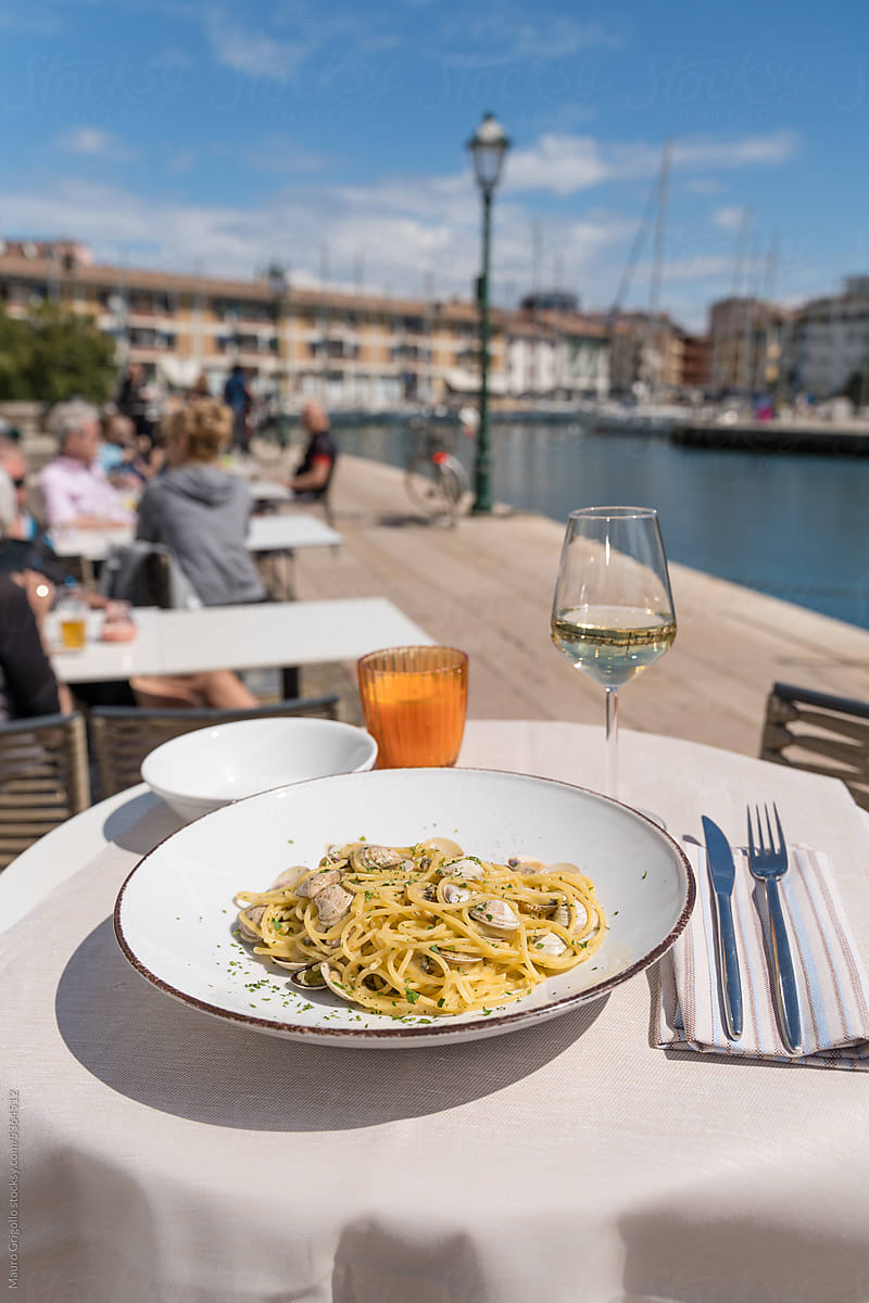 Spaghetti with clams in a restaurant outdoor