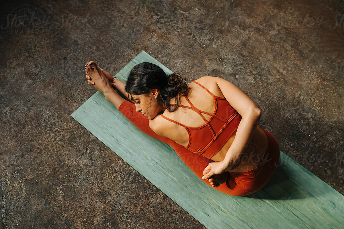 Top View of Woman Stretching on Yoga Mat