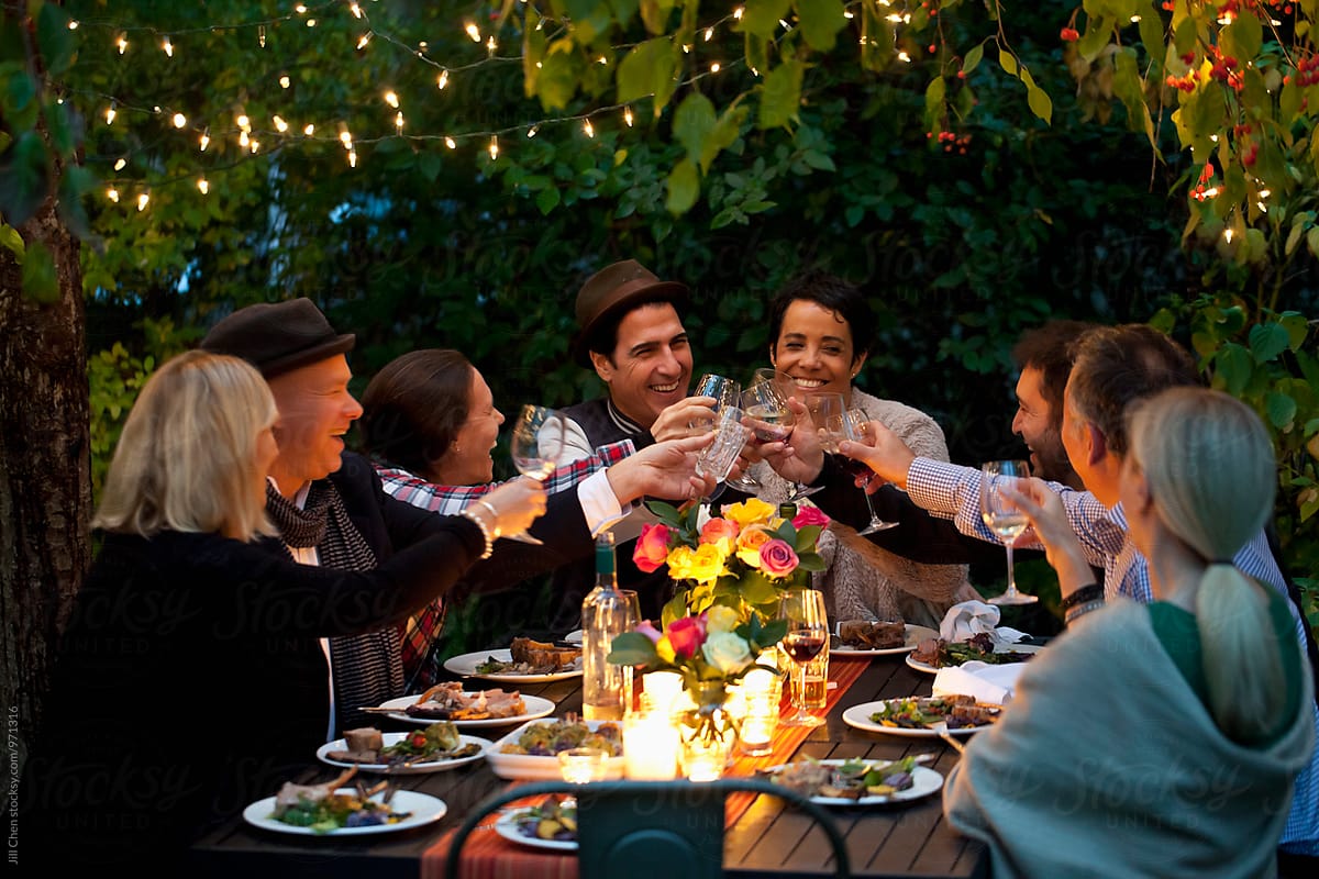 Friends Toasting At Dinner Party by Jill Chen - People, Dinner Party