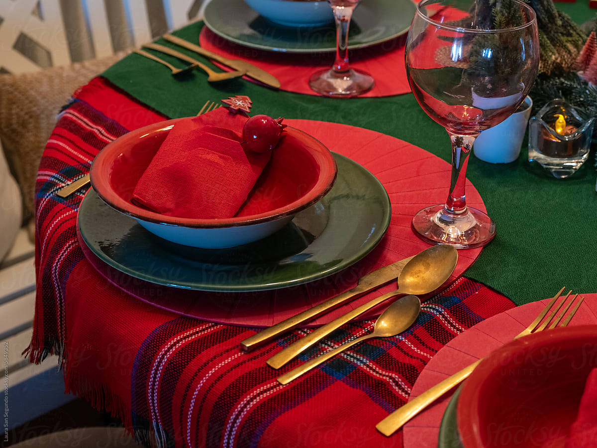 Festive Holiday table setting for a Christmas dinner party