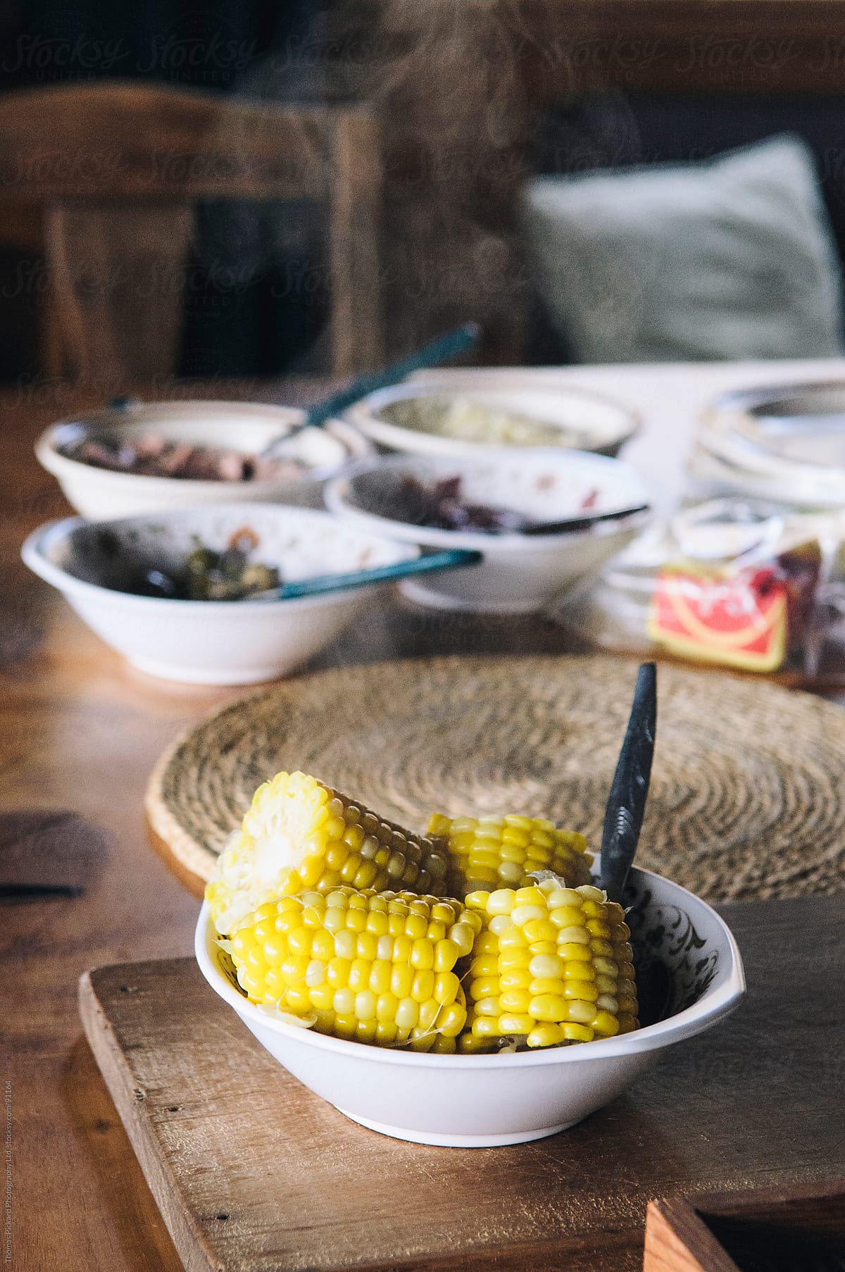 A bowl of steaming corn on the cob, New Zealand.