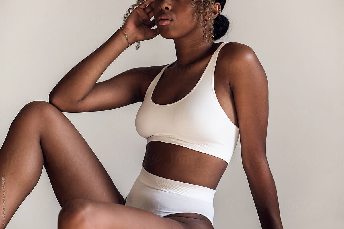 Black woman in white underwear