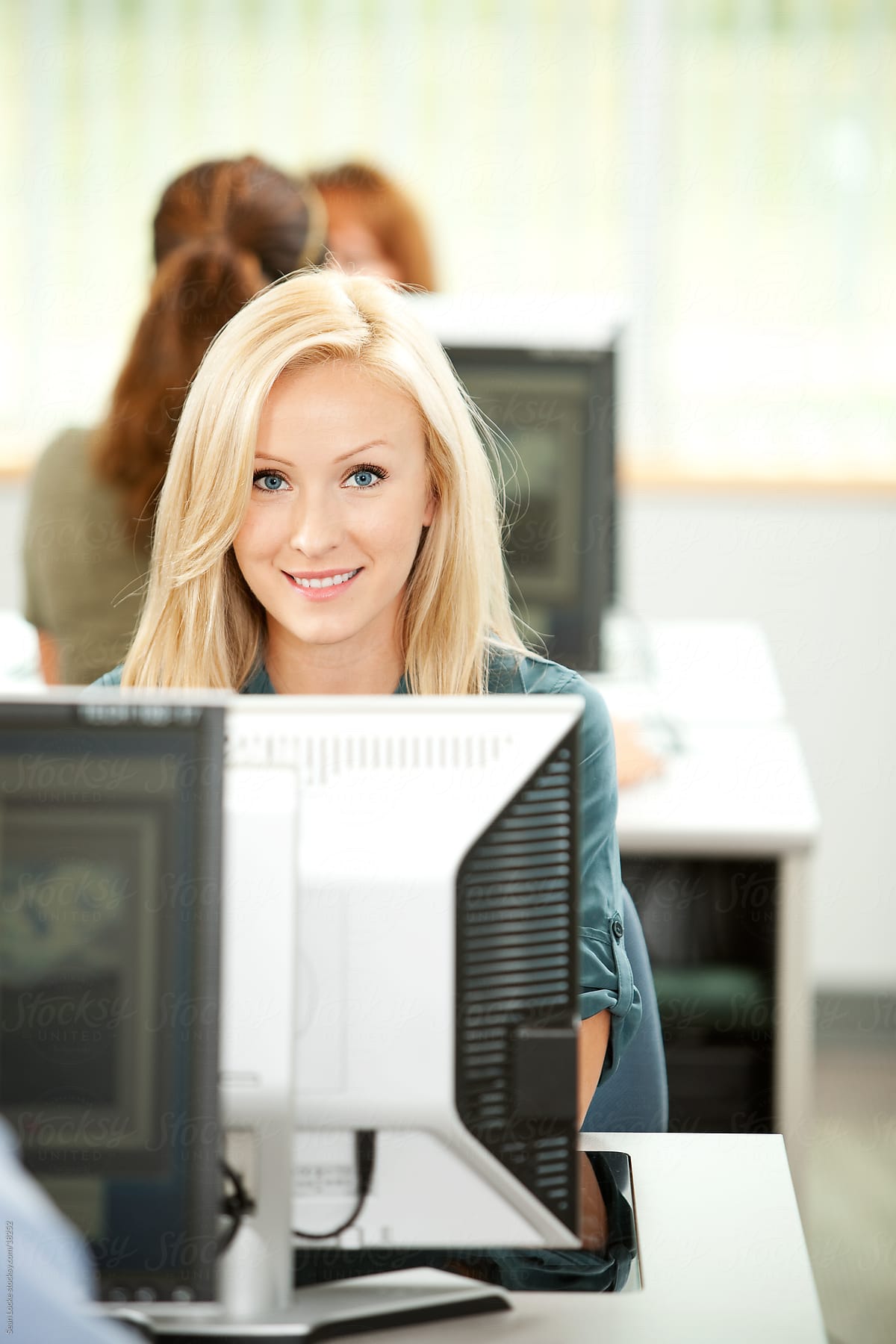 Computer Class: Woman Happy to Be Learning New Skill