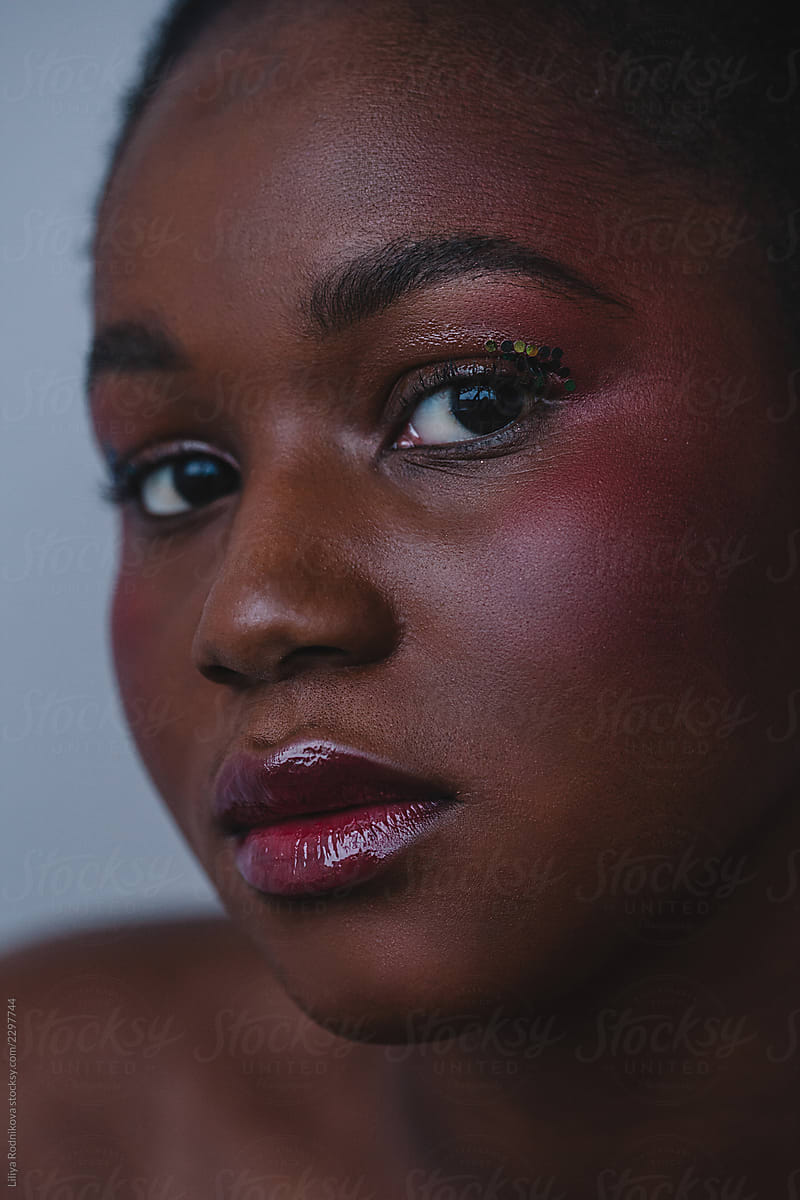 Closeup beauty portrait of young african female