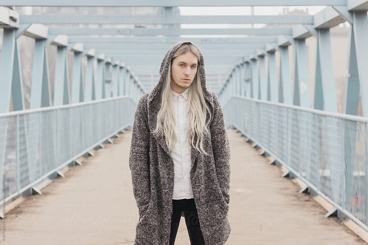Handsome Male Model With Long Blond Hair On The Bridge By Evil