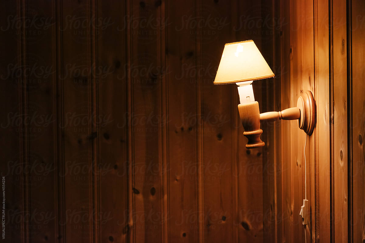 Retro Lamp in Dark Wooden Cabin Closeup