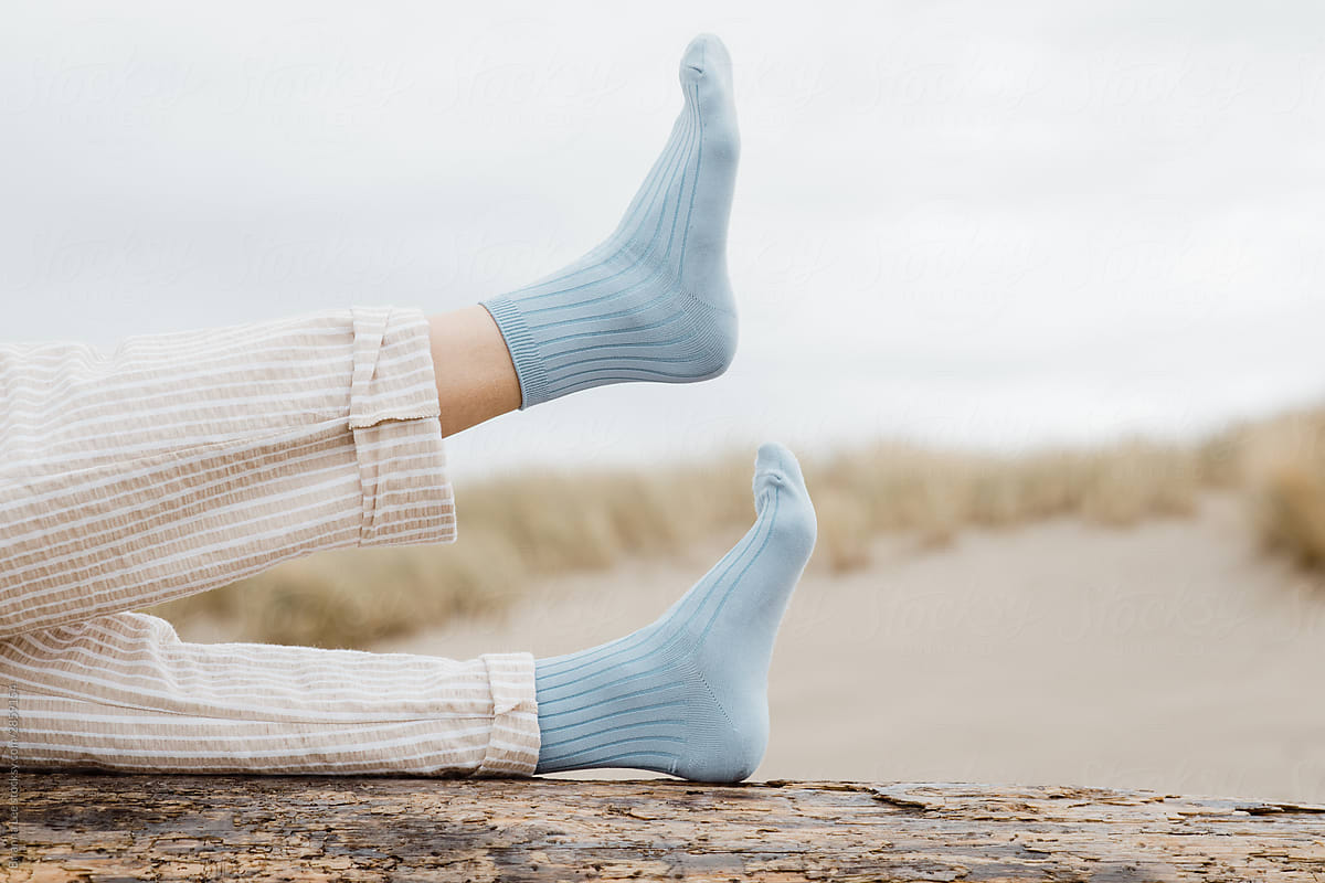 Trendy Young woman in fun blue socks