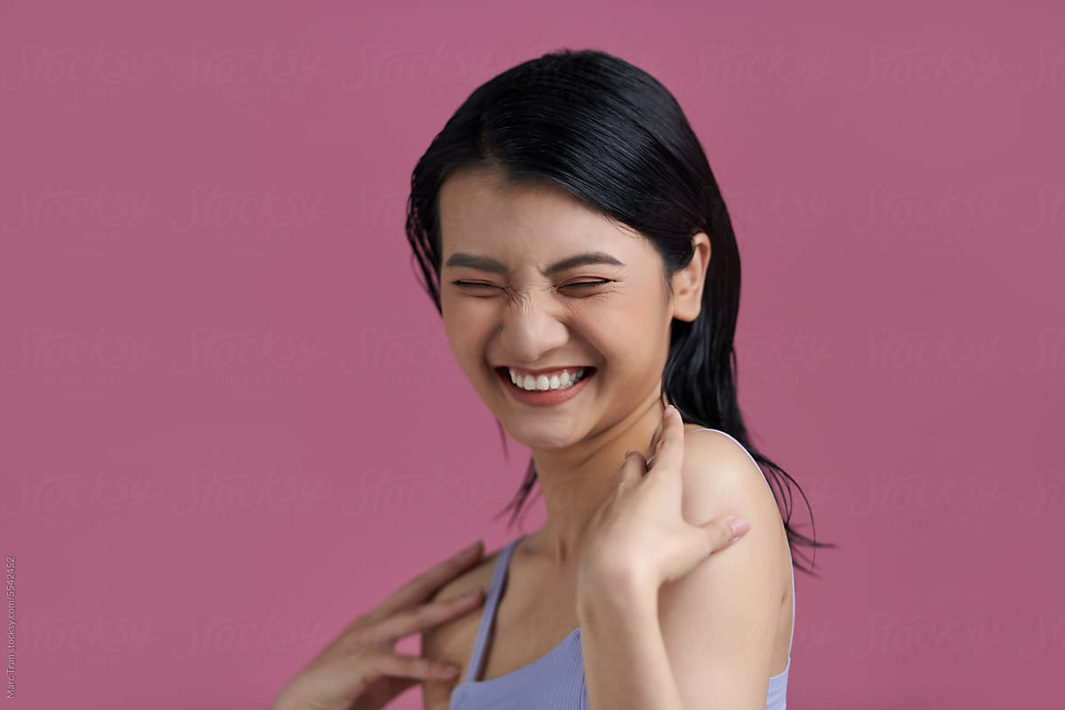 Beautiful young Asian woman model with perfect clean fresh skin