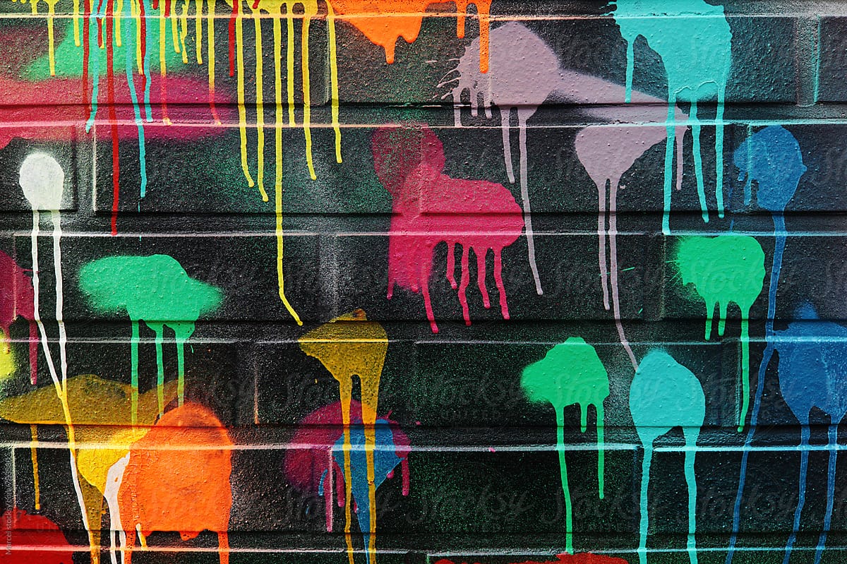 Colorful blotches of paint on a wall