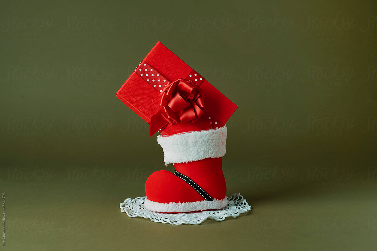 red gift box in a christmas stocking