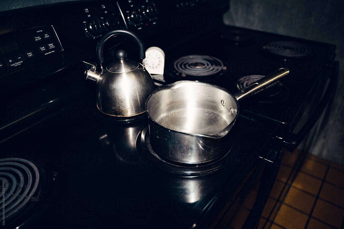 UGC pan with water on stove