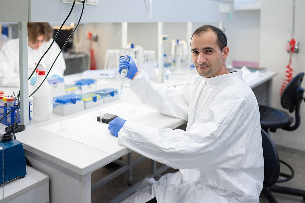 Scientist Using Pipette Portrait In The Lab