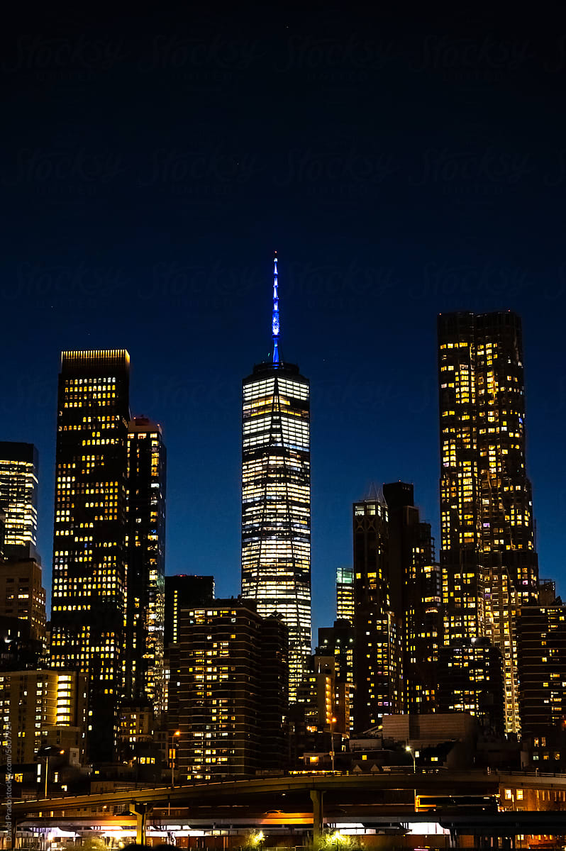 illuminated skyscrapers and World trade Center at twilight