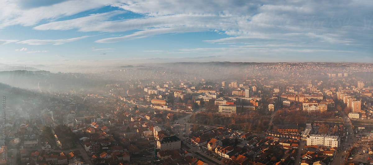 Panorama Of City In Fog