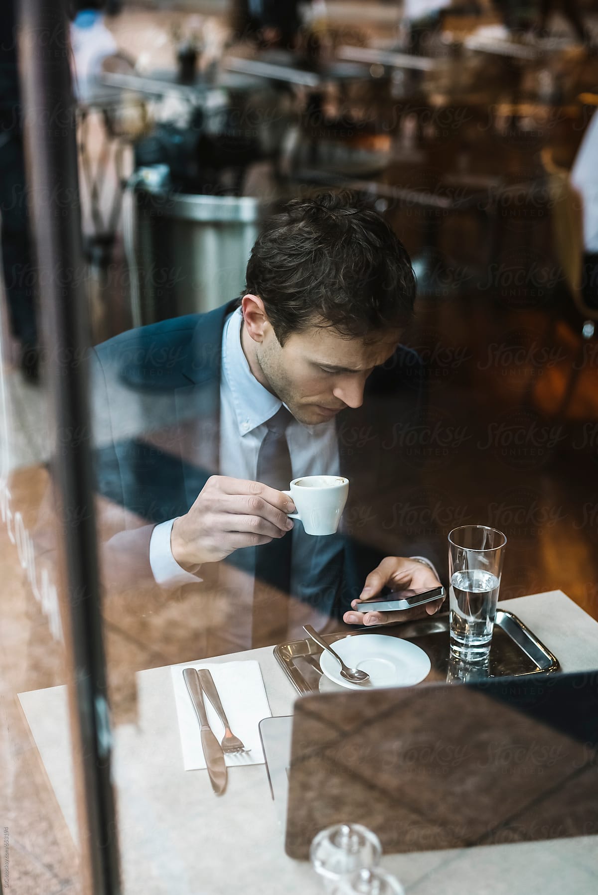 Businessman working sitting at cafe