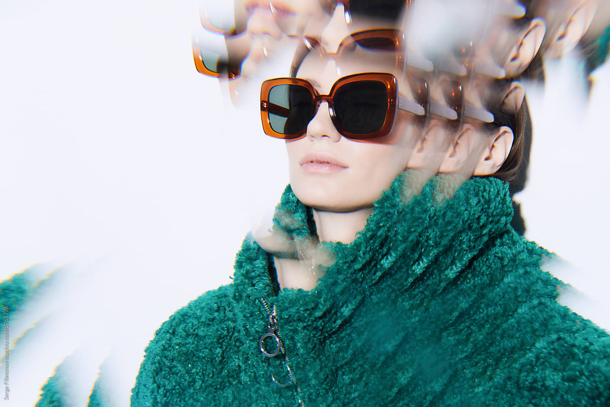 Sun portrait woman in sunglasses with kaleidoscope effect