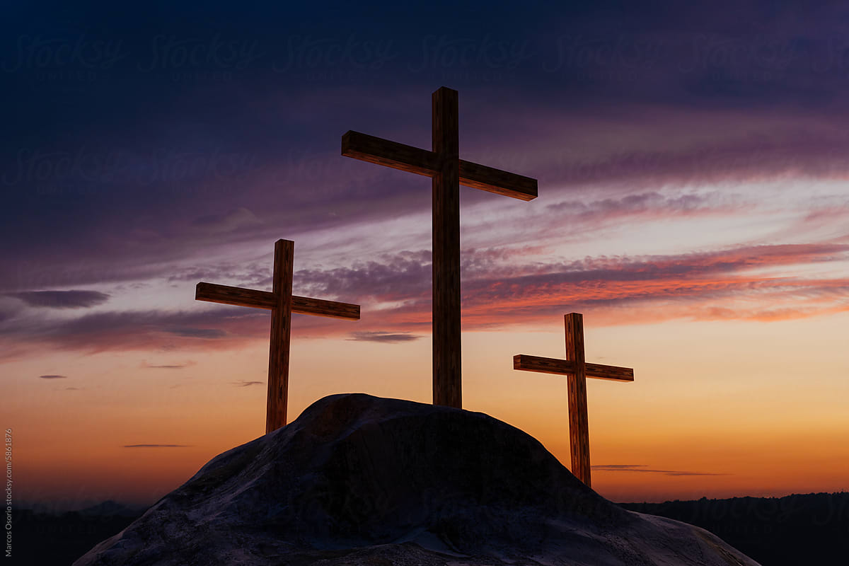 Serene Sunset Behind Three Crosses on a Hill