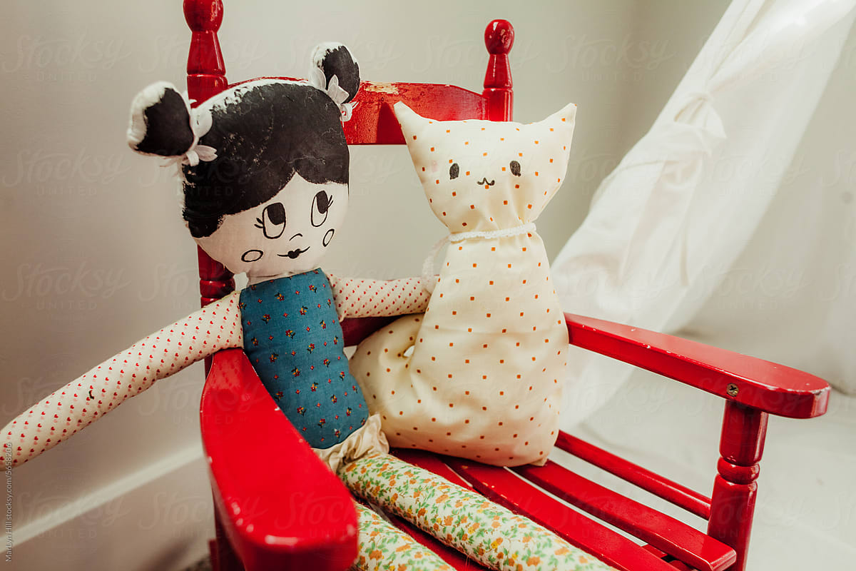 Cloth doll and cloth cat.