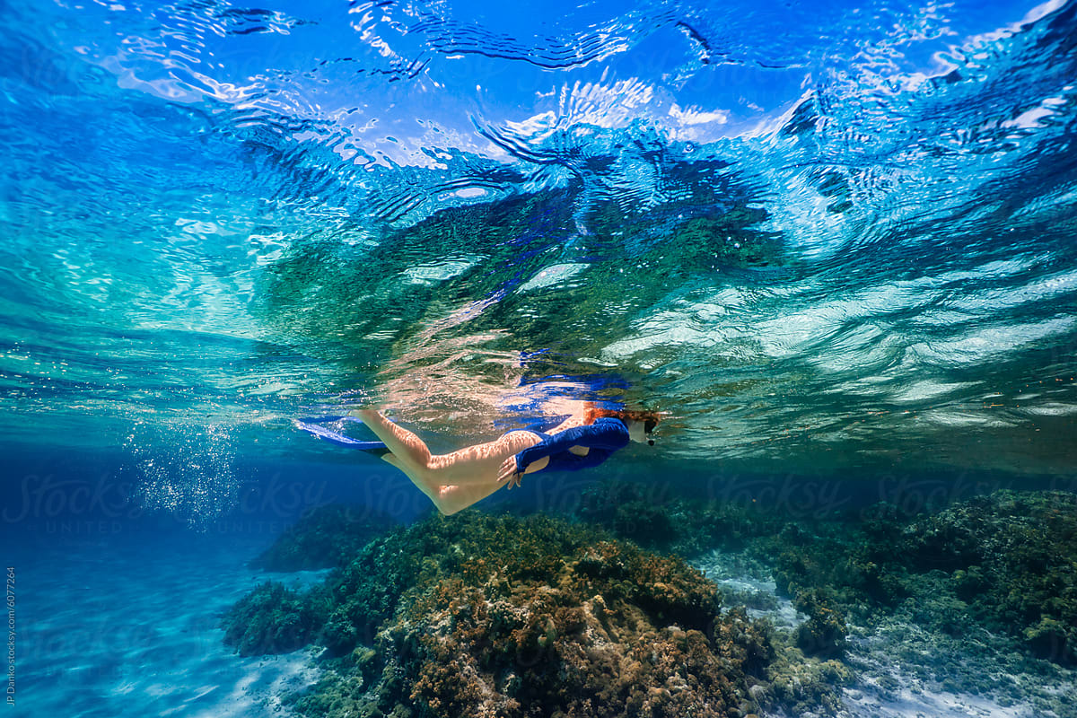 Woman Snorkeling over Caribbean Coral Reef Anegada BVI