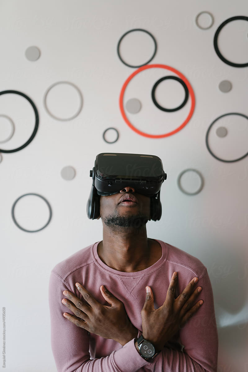 Black gamer in VR goggles
