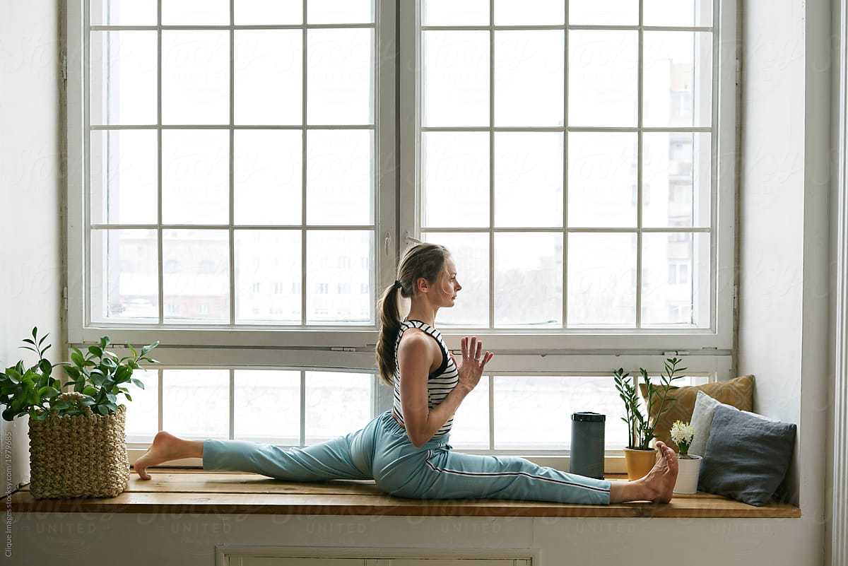 Woman doing yoga splits