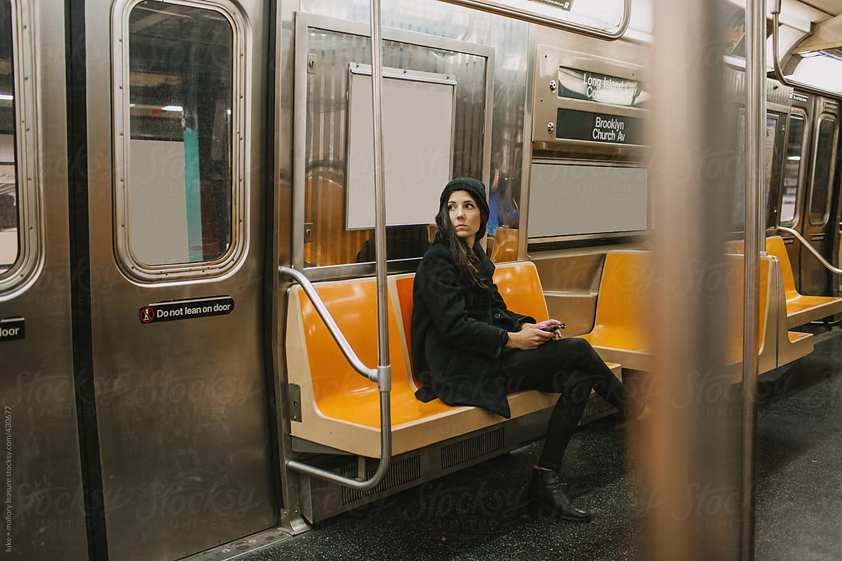 Woman alone on subway