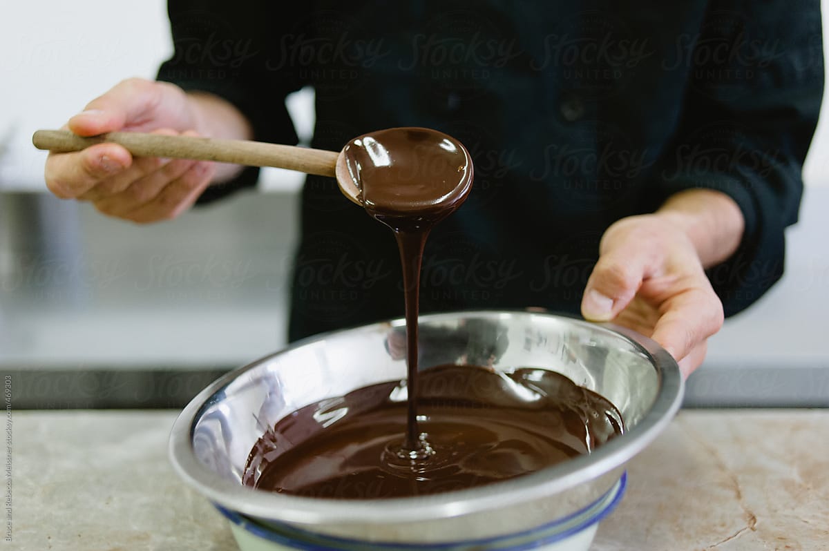 A Man Mixes Chocolate