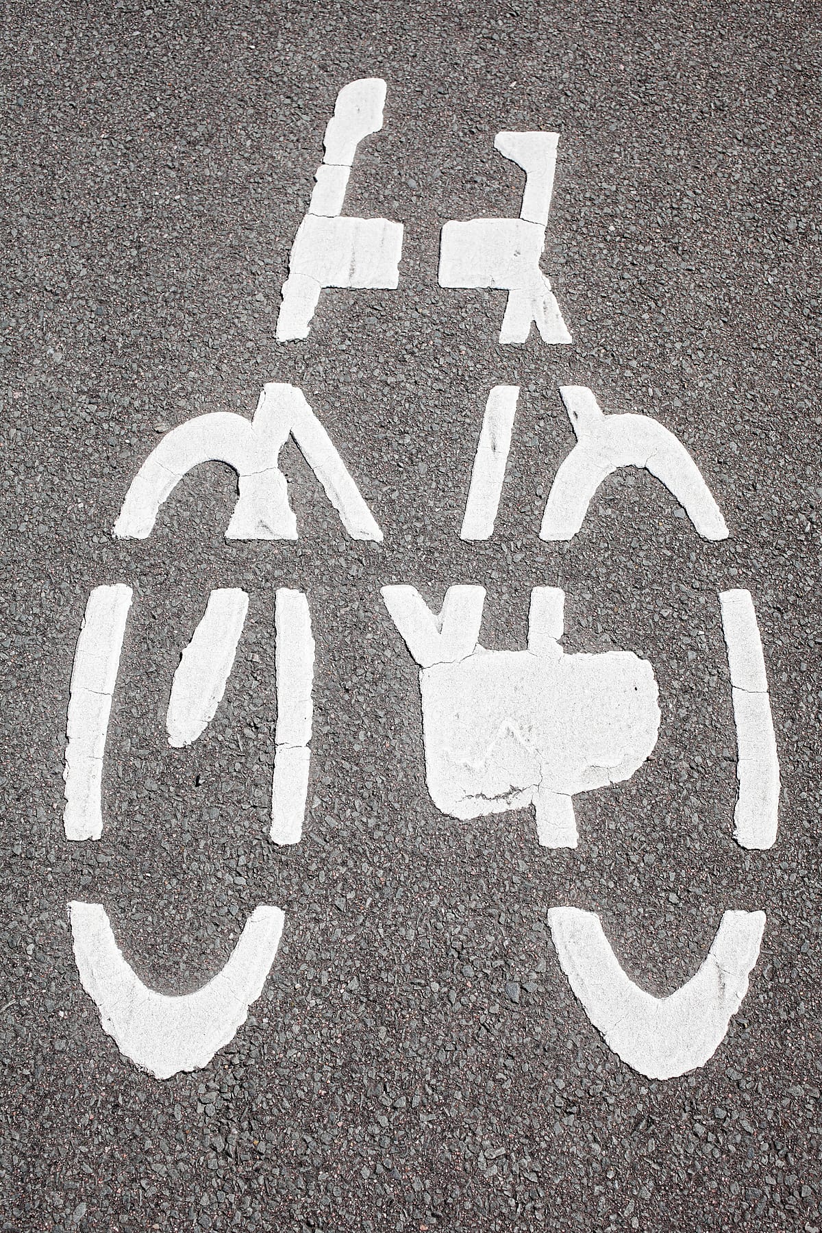 Bicycle lane sign on the asphalt