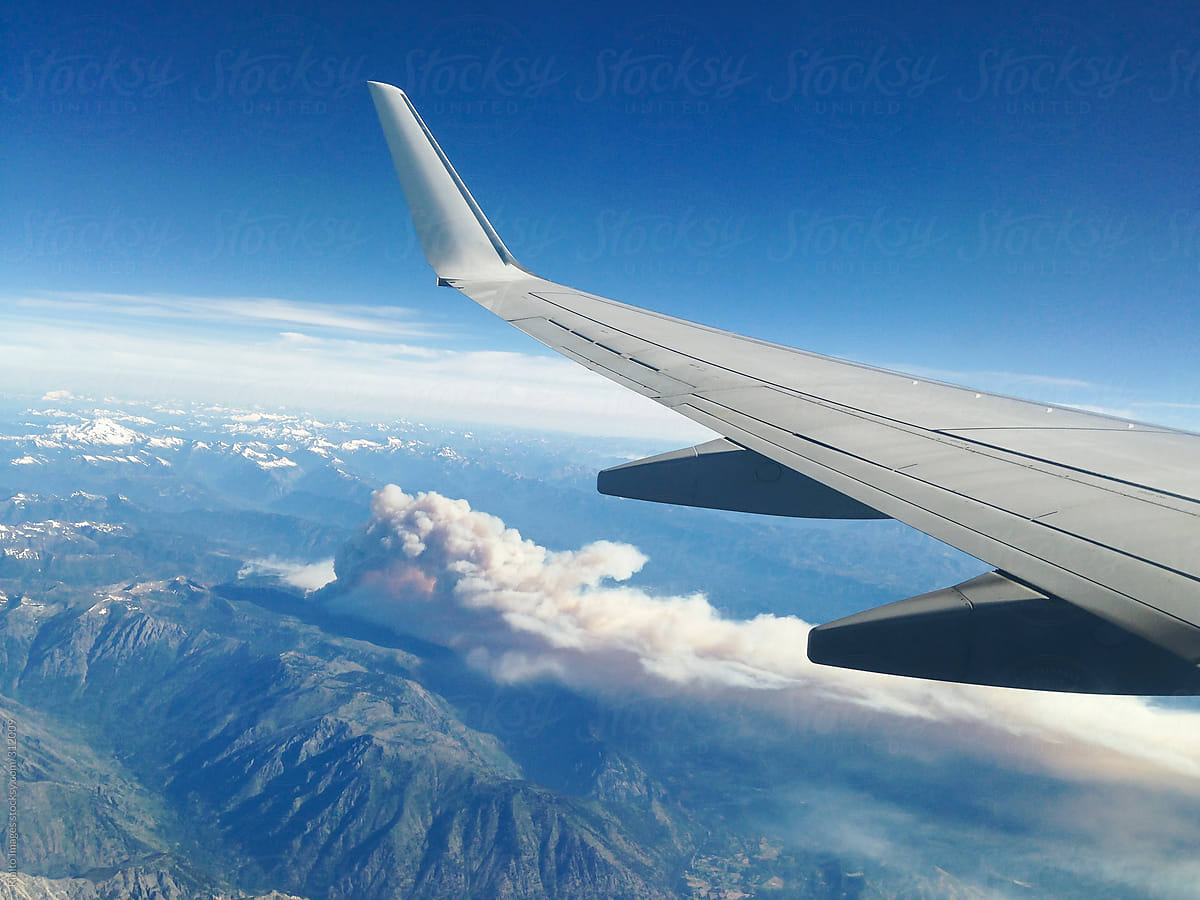 View from passenger jet of forest fire