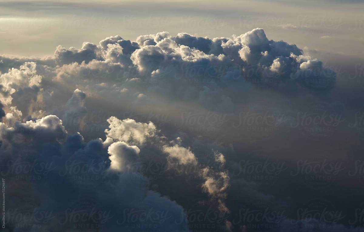 Closeup ethereal dreamy clouds, thousands of miles high in the sky