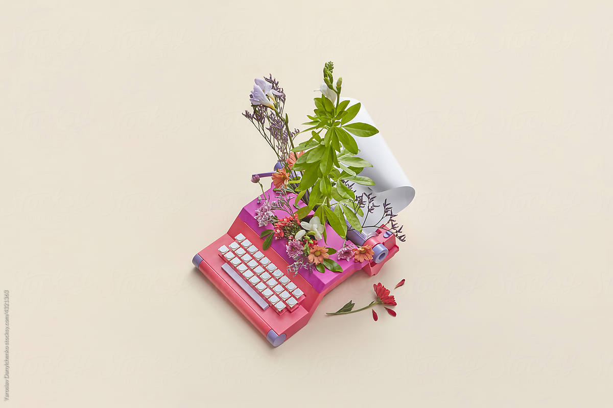 Bouquet of spring flowers inside typewriter