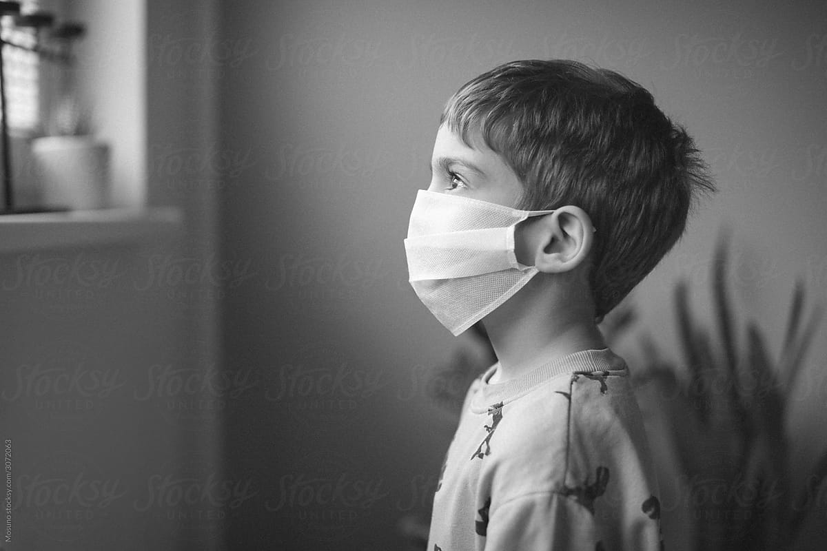 Boy with a protective Mask