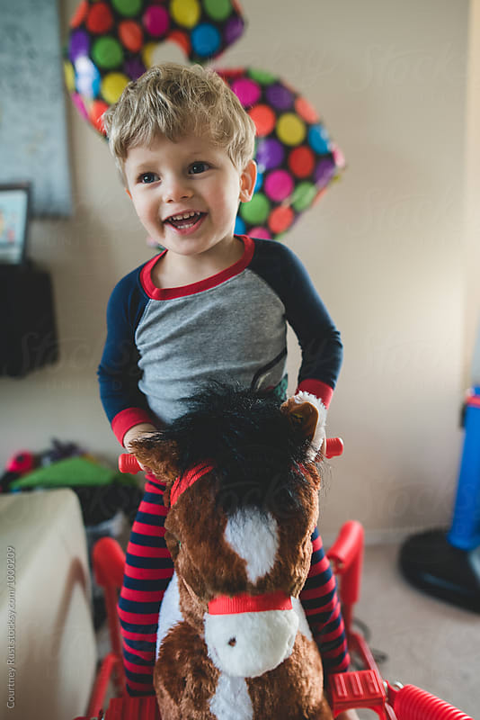 Birthday boy on a rocking horse