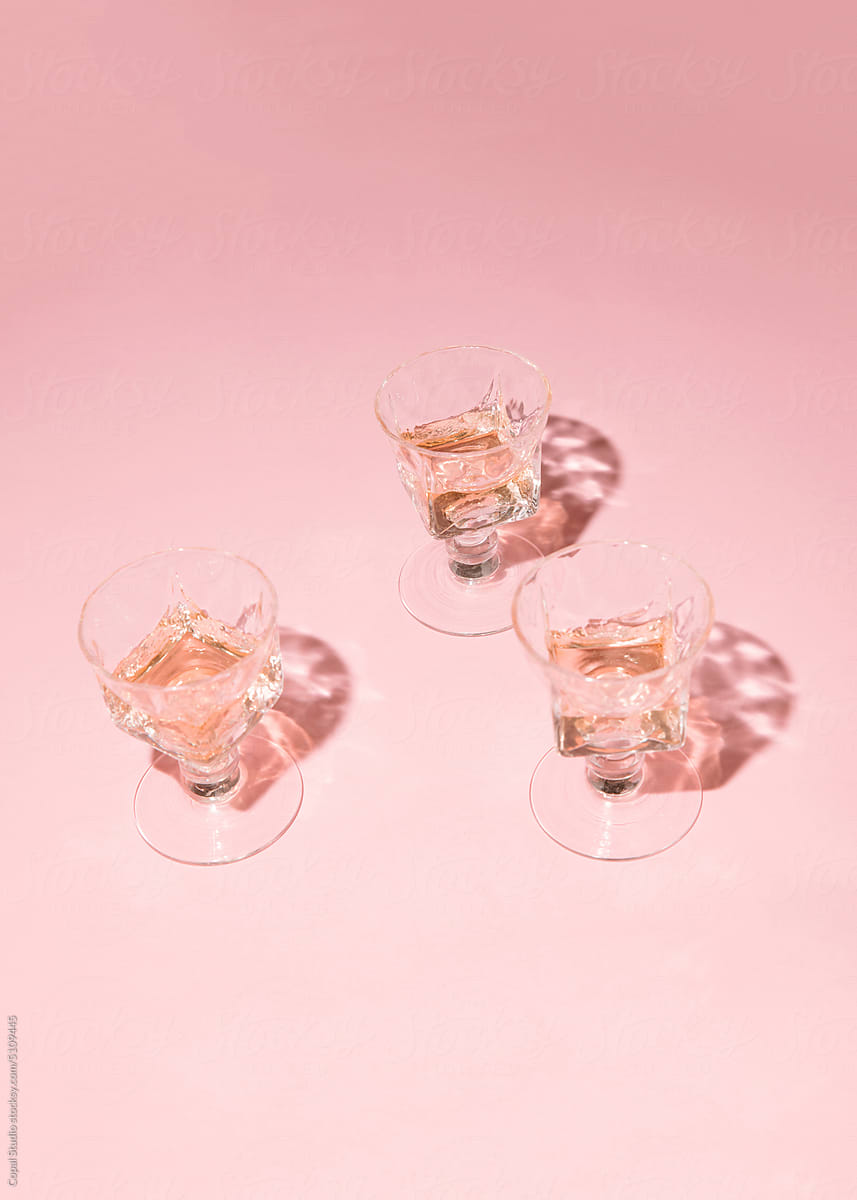3 Wine Glasses on pink background