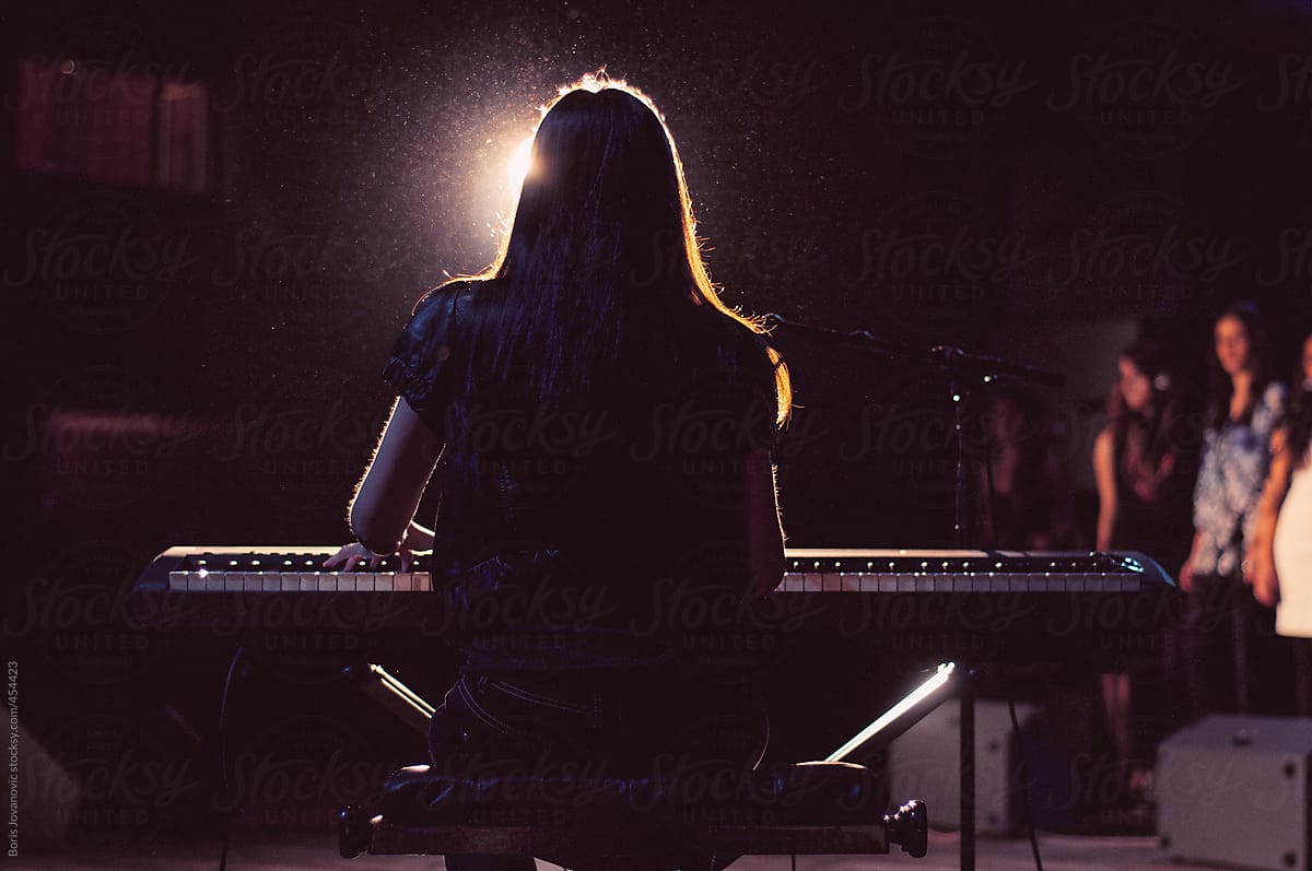 Anonymous woman playing piano