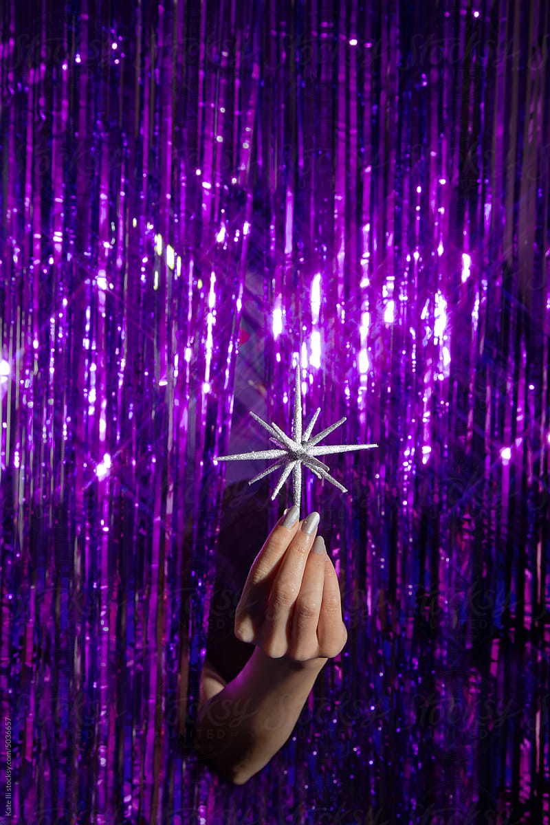 Female hand with a sparkling star